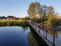 Old pedestrian bridge over the river Royalty Free Stock Photo