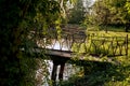 Old pedestrian bridge over the river Royalty Free Stock Photo