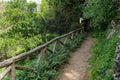 Old pedestrian trekking walkway road in the mountains. Wooden handrails. Greece, Rethymnon area. Touristic paths trail. Beautiful Royalty Free Stock Photo