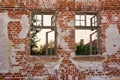 Old Peeled Lonely Brick Wall With Two Broken Windows Frame Royalty Free Stock Photo