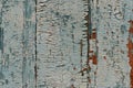 Old and peeling paint Over time, the green paint peeled off from the old boards and the wood texture cracked. Royalty Free Stock Photo