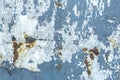 Old peeling paint texture on a wooden wall background. Pattern and texture of old dried paint and stucco on a rough surface Royalty Free Stock Photo