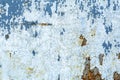 Old peeling paint texture on a wooden wall background. Pattern and texture of old dried paint and stucco on a rough surface Royalty Free Stock Photo