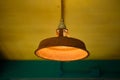 Old pendant hanging lamp with rusty metal lampshade Royalty Free Stock Photo