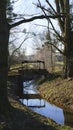 Old penstock, in the public park, with castle Favorite, Foerch Royalty Free Stock Photo