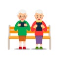 Old people with computer tablet in hands. Elderly women sitting on a bench with gadgets. Modern pensioner communication using