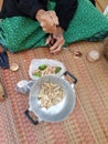 Old people cooking betel nut To chew in free time