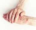 Old people holding hands. Closeup. Royalty Free Stock Photo