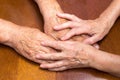 Old people holding hands. Closeup. Royalty Free Stock Photo