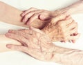 Old people holding hands. Closeup. Royalty Free Stock Photo