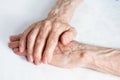 Old people holding hands. Closeup. Royalty Free Stock Photo