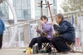 Old people play erhu for charity
