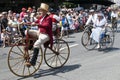 Old people riding ÃÂ©poque bicycles Royalty Free Stock Photo