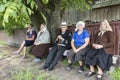 Old people sitting on a bench in Romania Royalty Free Stock Photo