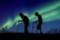 Old people at starry night. Elderly couple. Green aurora borealis