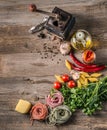 Old pepper mill and scattered pepper, topview Royalty Free Stock Photo