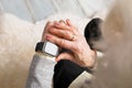 Old person using smart watch Royalty Free Stock Photo