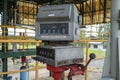 Old petrochemical flowmeter with mechanical counter on the fuel load tank farm, top loading, Europe