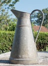 A old pewter pitcher outdoor Royalty Free Stock Photo