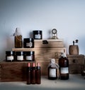 Old pharmacy. bottles, jars, clock on wooden shelves