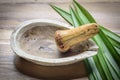 Old pharmacy mortar and ivory pestle with herb