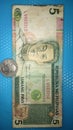Old philippine five peso 1989 and old us coin dollar 1949
