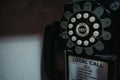 Old phone in phone booth closeup Royalty Free Stock Photo