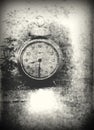 Old photo of the alarm clock - grained, scratched, overexposure