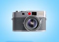 Old photo camera 3d render on blue background Royalty Free Stock Photo