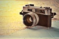 Old photo camera on world map Royalty Free Stock Photo