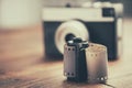 Old photo film rolls, cassette and retro camera Royalty Free Stock Photo