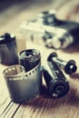 Old photo film rolls, cassette and retro camera. Royalty Free Stock Photo