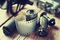 Old photo film rolls, cassette and retro camera. Royalty Free Stock Photo