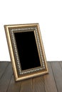 old photo frame on the wooden table Royalty Free Stock Photo