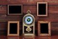 Old photo frames and antique clock Royalty Free Stock Photo