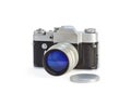 Old photocamera with lens cap Royalty Free Stock Photo