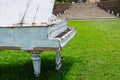 Old piano abandoned ouside