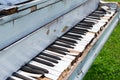 Old piano abandoned ouside