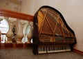 Old piano in the House of Culture. Royalty Free Stock Photo