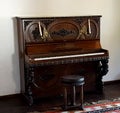 Old piano in music room in Bran castle, Romania Royalty Free Stock Photo