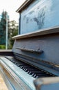 Old piano painted in blue color on the street Royalty Free Stock Photo