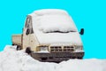 Old pickup truck in the snow. the car is isolated on a blue background