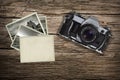 Old pictures with vintage camera on a leather case Royalty Free Stock Photo