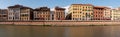 Old picturesque houses at the Arno river waterfront in Pisa Royalty Free Stock Photo