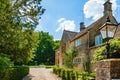 Picturesque stone cottage house on sunny day