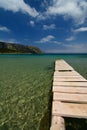 Old pier. Agios Konstantinos beach. Samos island. Greece Royalty Free Stock Photo