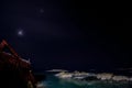 old pier and the contrasts of the sea and the starry sky of caleta chome Royalty Free Stock Photo