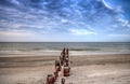 Old pier in the ocean at Port Royal Beach at sunrise Royalty Free Stock Photo