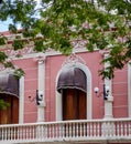 Old pink building with arched windows Royalty Free Stock Photo