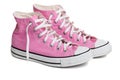 Old pink coloured basketball shoes Royalty Free Stock Photo